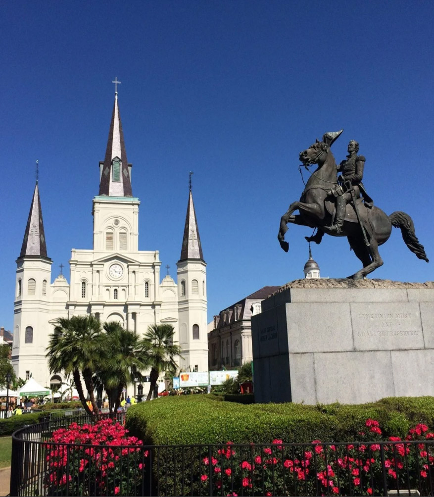 The cathedral's three steeples above Jackson Square and the Andrew Jackson statue